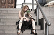 pretty young woman sitting on the stair pretty young woman sitting on the stair