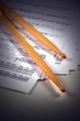 drumstick with music sheet