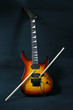 electric guitar with drumstick