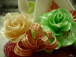 two sugar roses, with bow