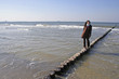young brunette walking on water