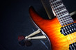 electric guitar with drumstick