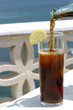 glass of cola on terrace glass of cola on terrace