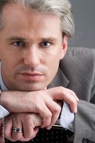 portrait of a businessman with his hands