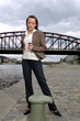 standing woman with mobile phone