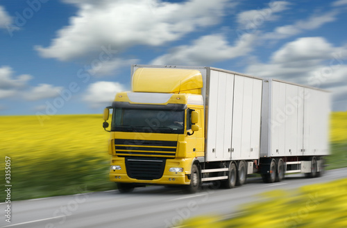 Photo: truck driving on country-road truck driving on country-road