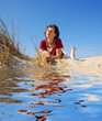 girl lying in the sand