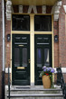 home entrance with two doors
