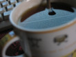 cup of tea with a text mirrored in it