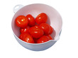 tomatoes in white bowl;