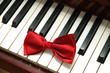 red bow tie on white piano keys red bow tie on white piano keys