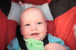 baby sitting in stroller. close-up #3