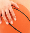 woman holding Basketball