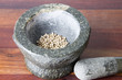 white pepper in mortage with pestle