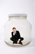 businessman locked in the jar