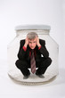 businessman locked in the jar