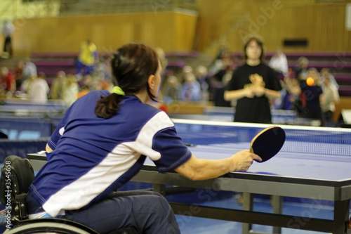 Photo: A disability female playing table tennis A disability female playing table tennis