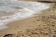 Sea waves and sand beach