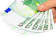 Male hand holding euro notes isolated on white (clipping path)