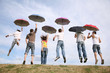 friends with umbrellas