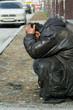 Photo: Homeless tramp. Homeless tramp.