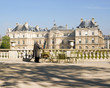 Man painting in front of the Palais du Luxembourg, Paris