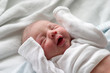 Baby boy making funny faces while sleeping Baby boy making funny faces while sleeping