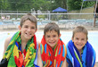 Boys at the Pool with beach towels