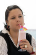 Portrait of the girl in cafe on quay