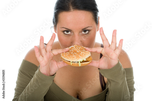 Foto: Cute chubby eating a hamburger Cute chubby eating a hamburger