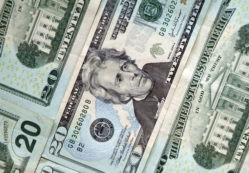 Photo: several flat twenty dollar bills background several flat twenty dollar bills background