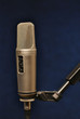 Microphone in professional studio on dark background