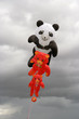 Teddy Bear Kites flying with an overcast sky