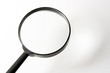 real    magnifying    glass    on   the     white     background