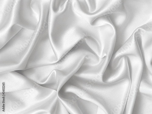 Photo: Elegant folds of white silk. Elegant folds of white silk.