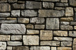Section of chiseled stacked stones in a wall Section of chiseled stacked stones in a wall