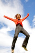 casual girl looking very happy in mid air
