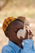 African boy drinking