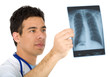 doctor looking at an xray of a thorax