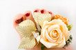 Beautiful woman feet with flowers