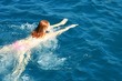 Girl  bathe in the sea