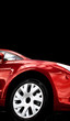 red car wheel close up on a black background