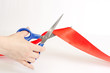 Scissors cutting a red tape Scissors cutting a red tape