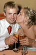 Bride and groom cheers on their wedding day