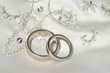wedding bands on embroidered dress