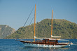 Beautiful Yacht against green mountain Beautiful Yacht against green mountain