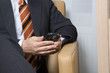 Businessman reading email on his mobile phone