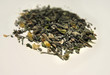Herbal tea with flowers against white background