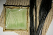 Square sushi plate, seaweed Kombu on a bamboo mat