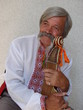 Photo: Senior ukrainian musician with bandura 7 Senior ukrainian musician with bandura 7